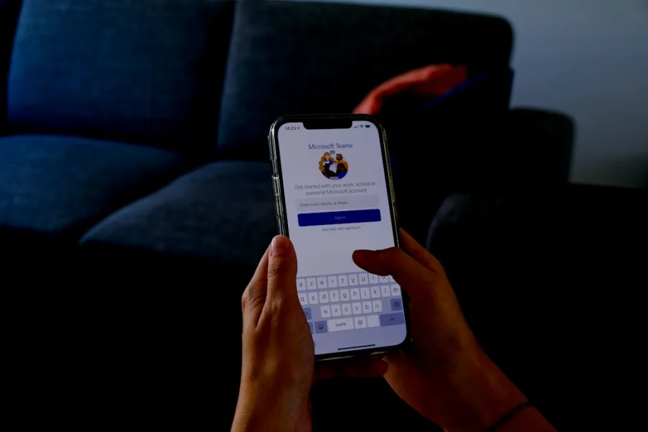 person holding silver iphone 6