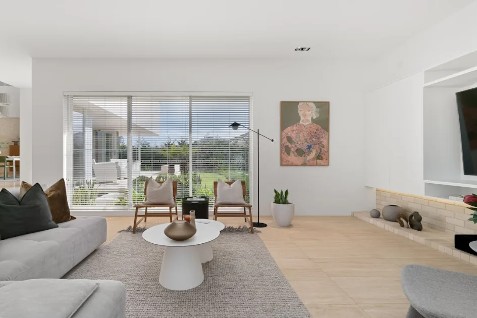 A living room filled with furniture and a flat screen TV